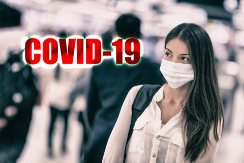 COVID-19 Novel Coronavirus virus infection spreading from Wuhan city, China. Asian woman wearing virus surgical face mask with text title. Chinese people walking to work at train station or airport.